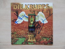 Die Krupps autographs signed CD booklet "Odyssey The Mind"