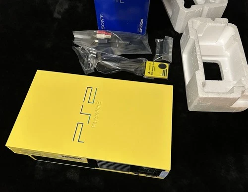 SONY PLAYSTATION 2 EUROPEAN AUTOMOBILE LIGHT YELLOW EXTREMELY RARE/ SUPER MINTY!
