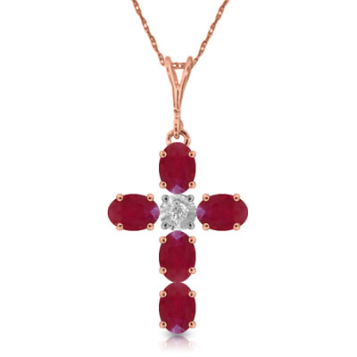 14K. GOLDKREUZ MIT NATÜRLICHEM DIAMANT & RUBINEN