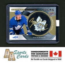 2018-19 UD TRILOGY SIGNATURE PUCKS TEAM LOGO ZACH HYMAN AUTO #SP-ZH (02/19)