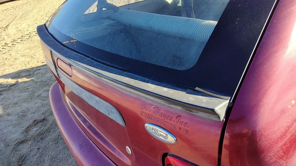 Alerón trasero Ford Aspire 1994-1997 OEM F4BZ6144210C Foto 2 de 4