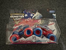 Monster Jam Official Stars and Stripes El Toro Loco vs Megalodon 1:64 Scale NEW