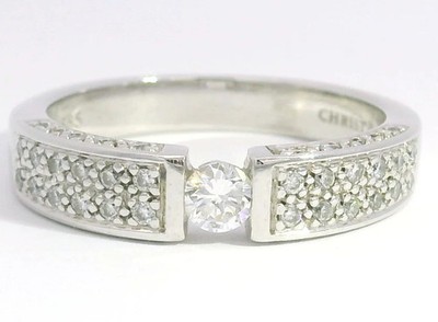 Ring 585 Weißgold 14K 1 Brillant ca. 0,16ct mit div. kleinen weiteren Diamanten