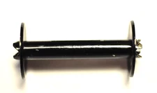 828 empty metal film spool.