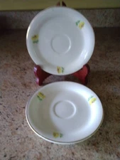 Homer Laughlin Eggshell Demitasse 2 Saucers  Gold Edge Line Yellow Flowers EUC