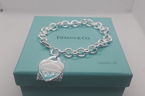 Return toTiiffany Co Blue Enamel Splash Heart Tag Bracelet 8.2"