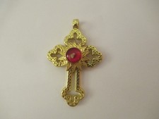 Gold-Colored Metal Cross Pendant with Red Center