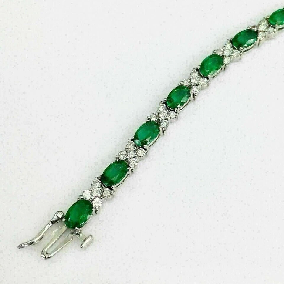 Brazalete de tenis para mujer de diamantes y esmeraldas de corte ovalado de 12 quilates de oro blanco de 14 quilates de más de 7" Foto 2 de 4