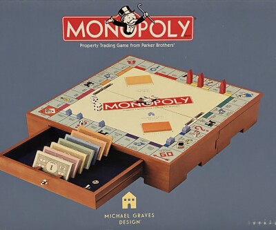 とても高価な英国製ノスタルジーMONOPOLY 木製箱版。未使用品 RARE FIRST EDITION 2002 Monopoly MICHAEL GRAVES Design Cherry Wood
