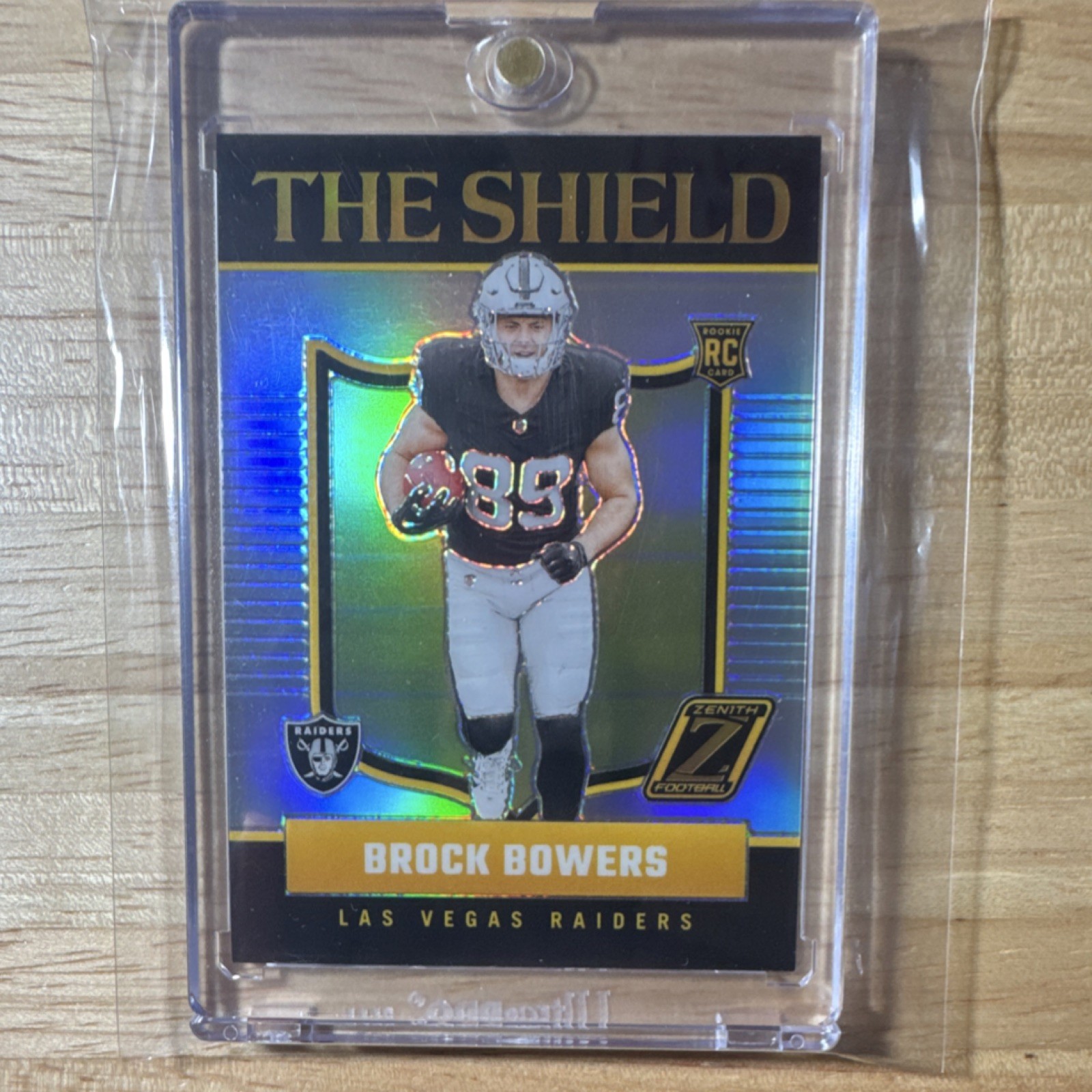 Panini 2024 Zenith The Shield Brock Bowers Prizm RC Raiders #8 SSP