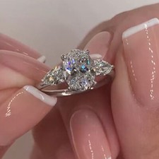 2.50 CTW Oval VVS1 Moissanite Three Stone Engagement Ring 14k White Gold Plated