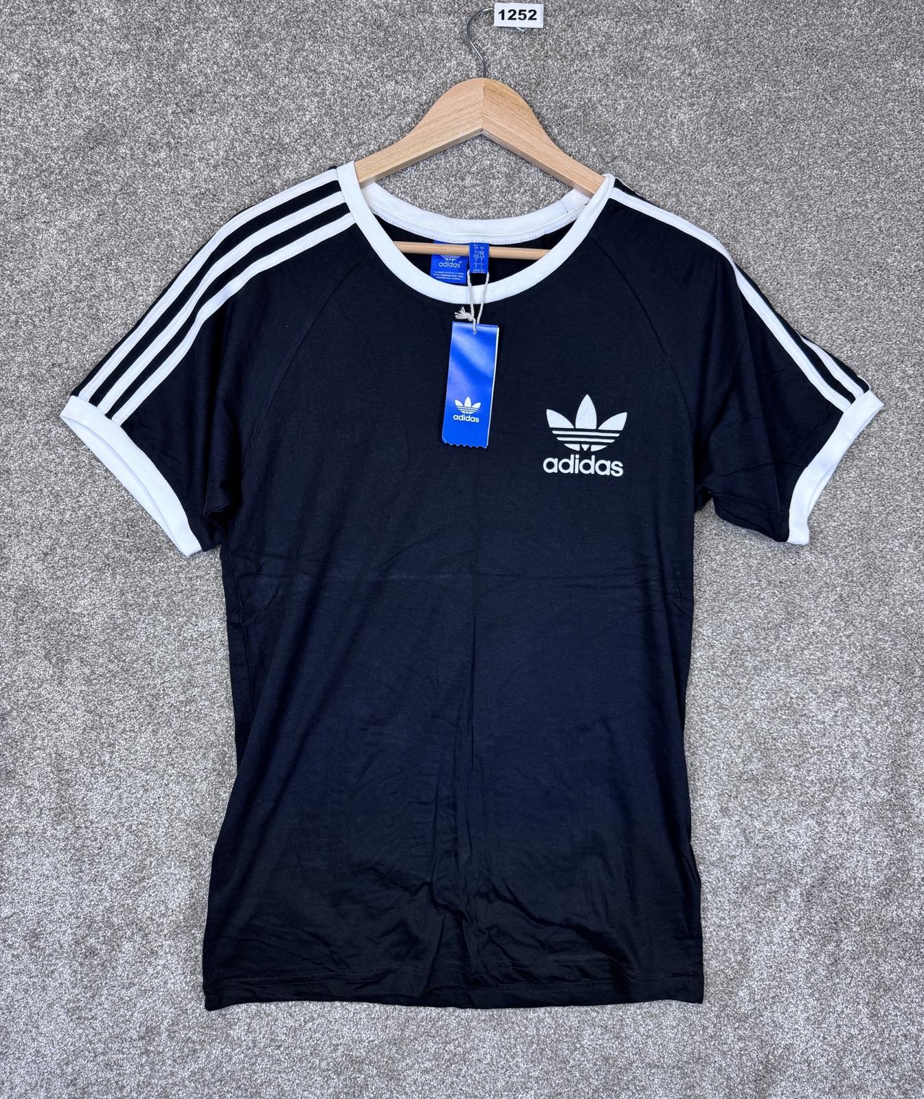 Camiseta para mujer Adidas blanca y negra cuello redondo con rayas clásicas
