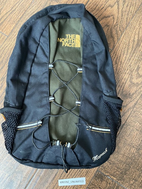 army green north face backpack
