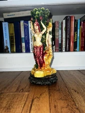 EXOTIC LADIES, EGYPTIAN STYLE CANDLE STICK HOLDER. 10” HIGH