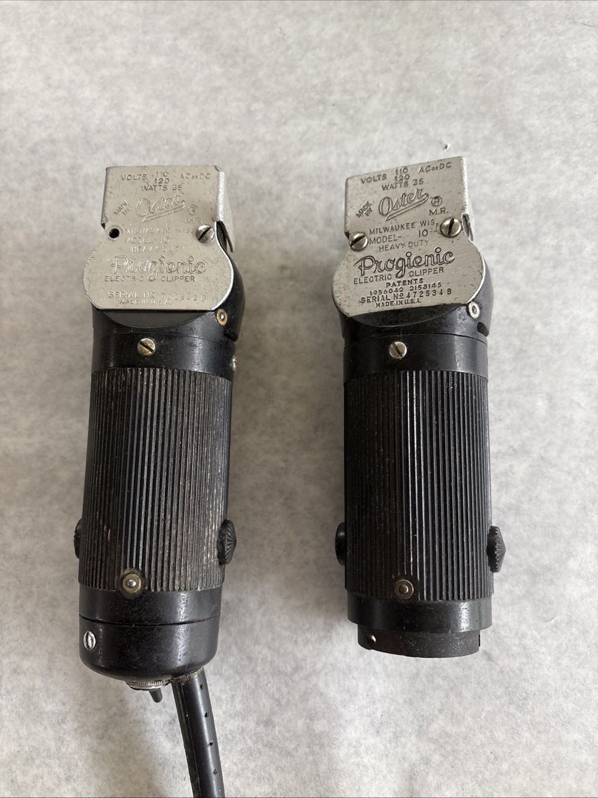 2 Oster Progienic Working Clippers, No Blade Sets.