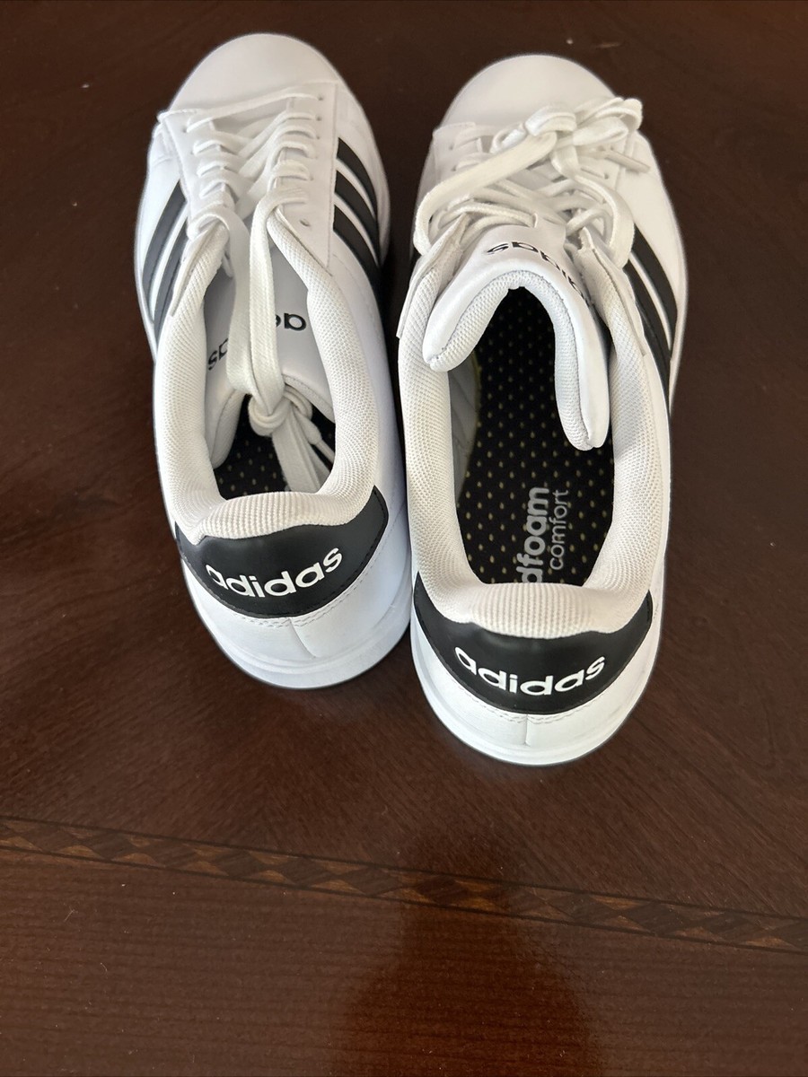 adidas with black stripes on one side