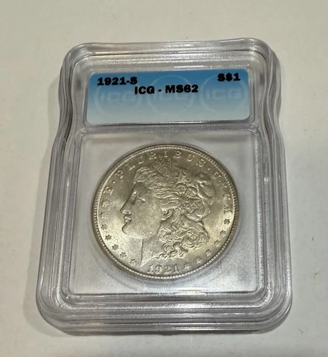 1921-S Morgan Silver Dollar in a protective ICG slab is graded MS62