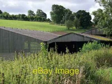Photo 6x4 Barns at Throope Manor Pitts, The The ploughed area behind the  c2008