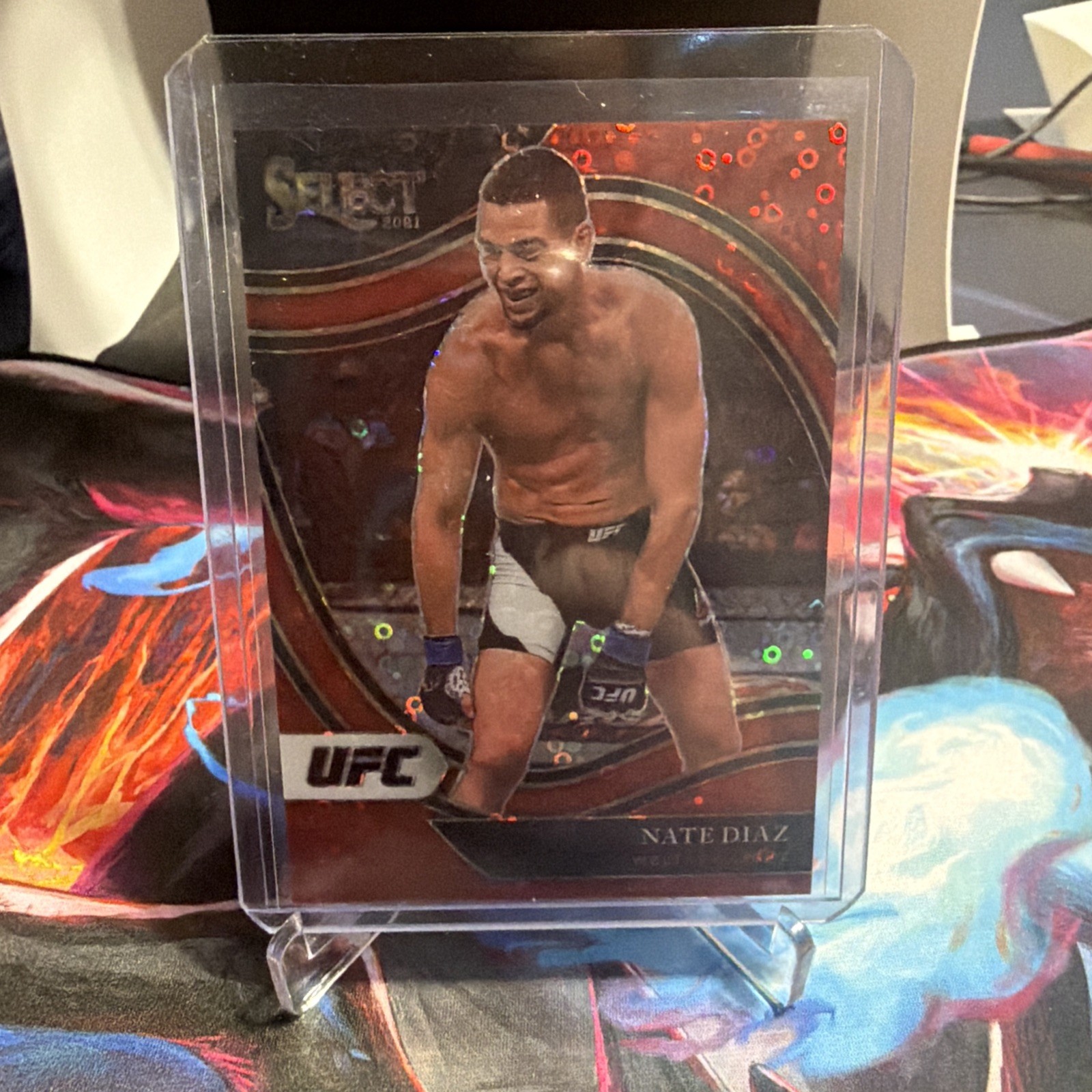 2021 Panini Select UFC Nate Diaz Octagonside Red Disco Prizm /199