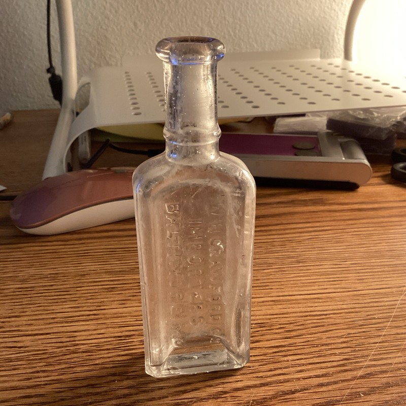 W.H. Crawford Co Spices Exps Drugs Inc. Baltimore MD Clear Medicine Bottle