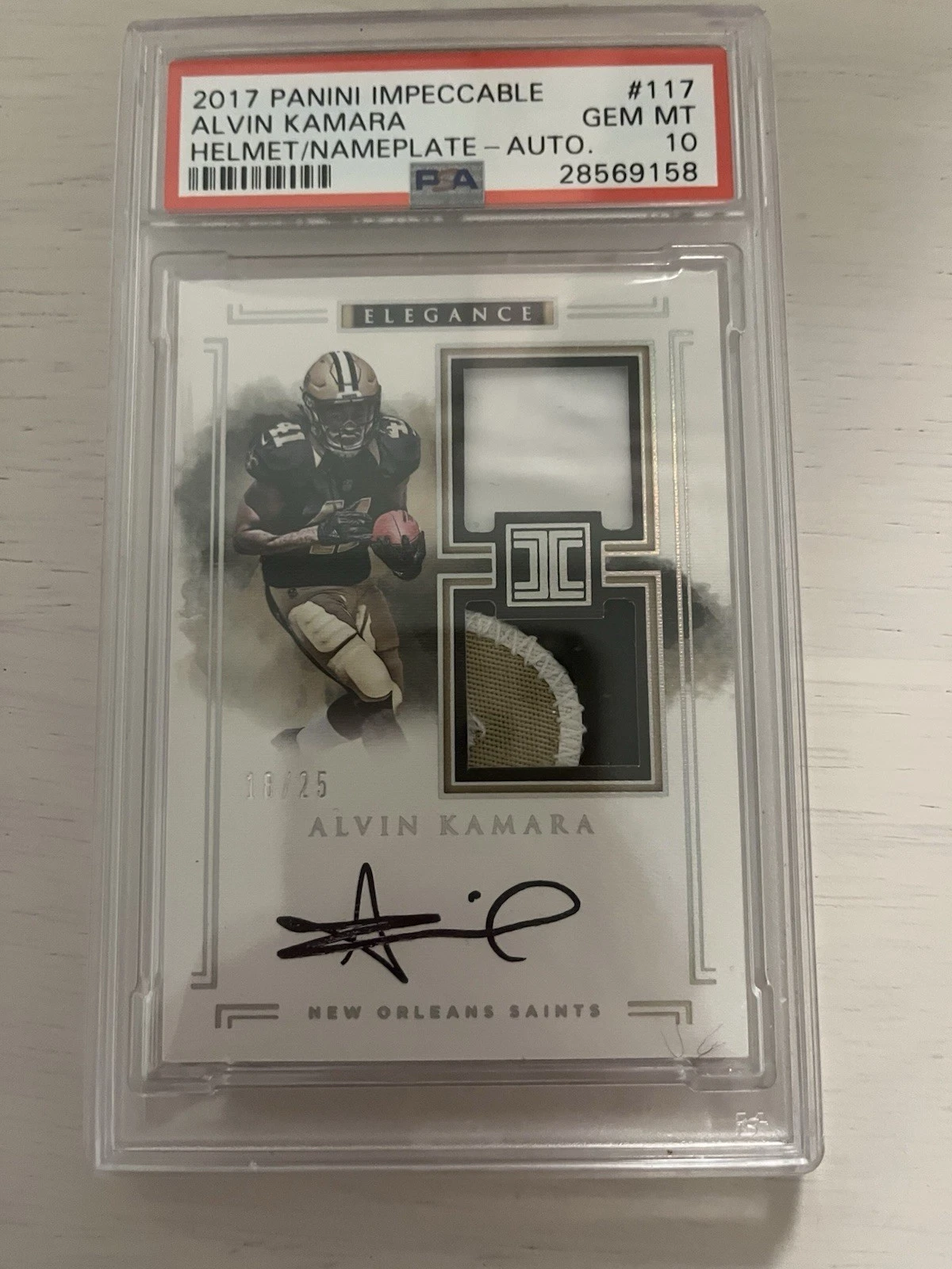Alvin Kamara Panini Impeccable #117 Helmet/Nameplate-Autograph