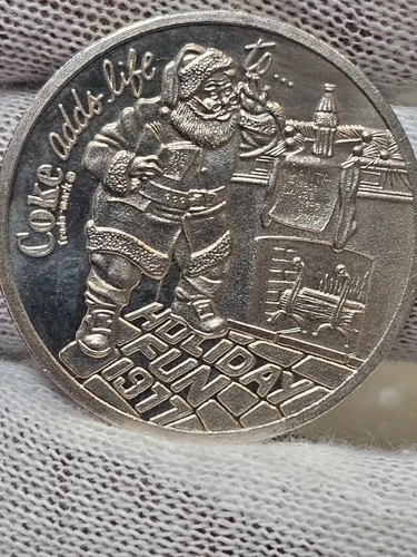 Coca-Cola Holiday Fun 1977 Coke adds life. . . 1/2 Troy Oz. .999 Fine Silver Rd.