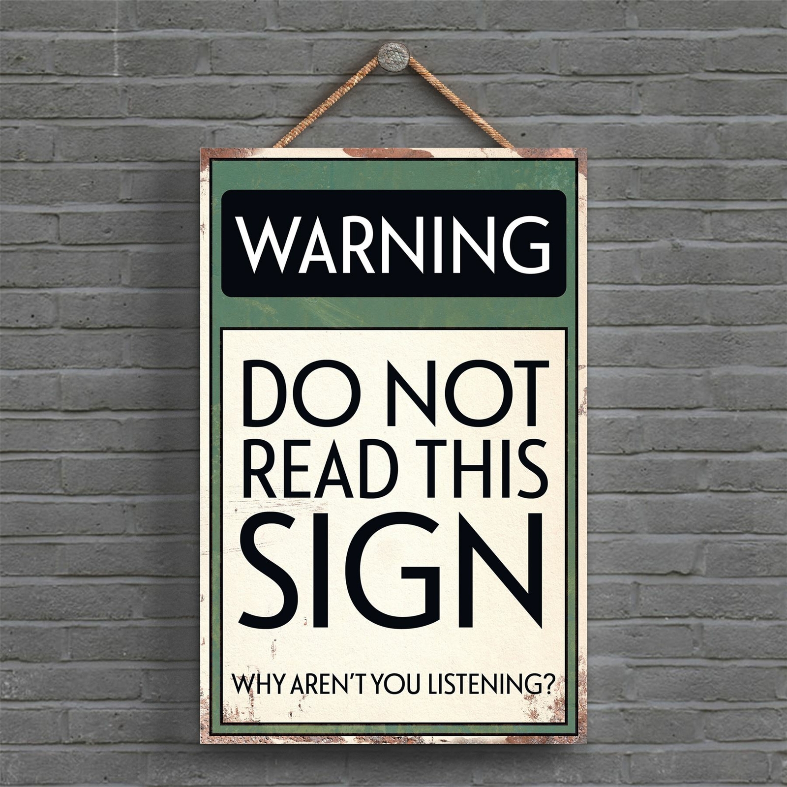 WARNING DO NOT READ THIS SIGN TYPOGRAPHY SIGN PRINTED ONTO A PLAQUE