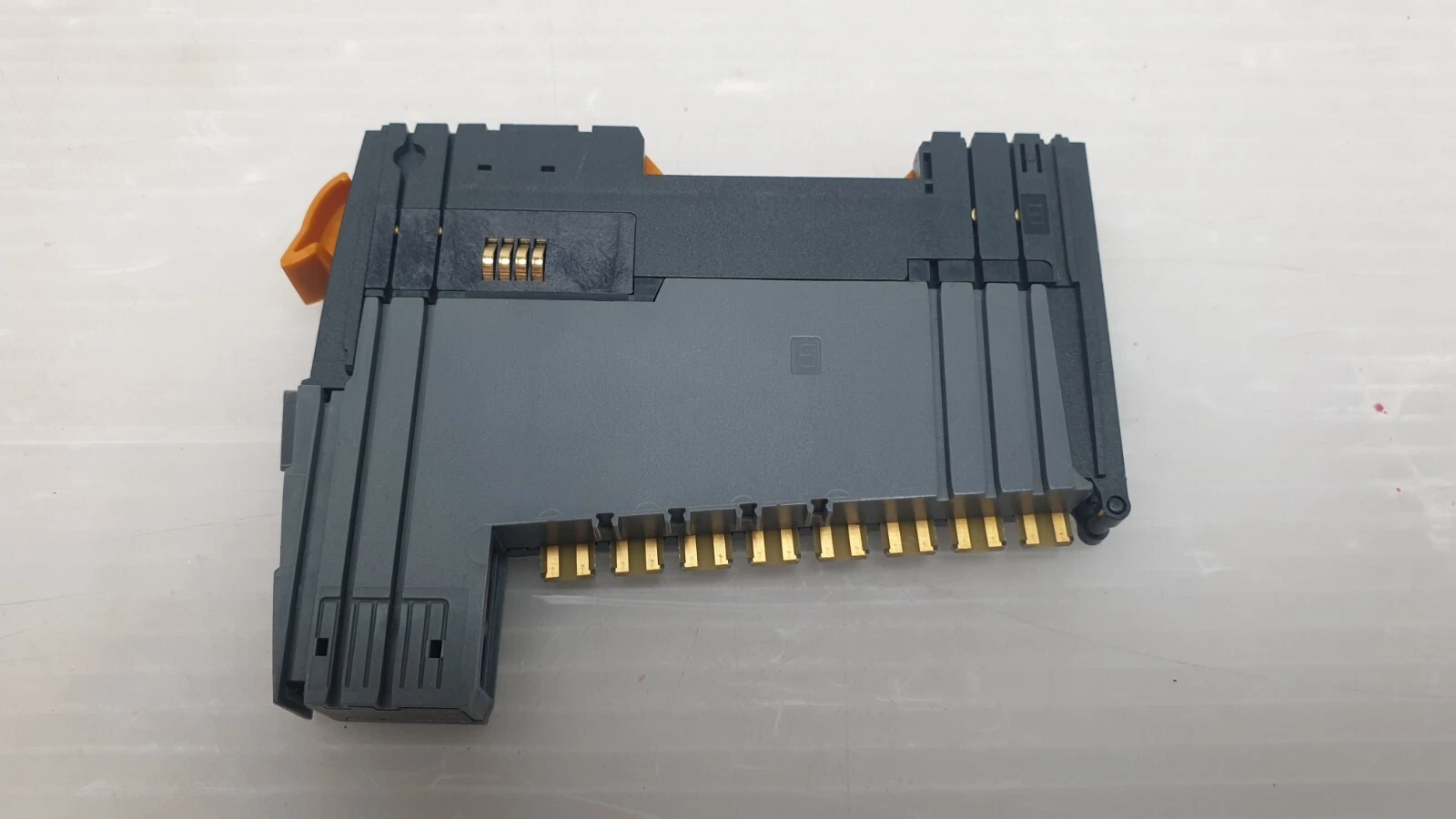 Opposite side of the B&R X20 module on its bus module, with contact pins