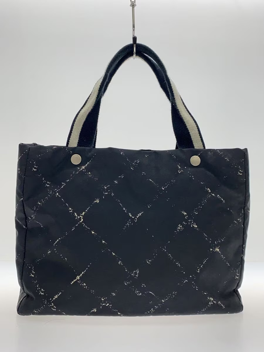CHANEL black nylon tote bag with iconic CC logo