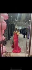 Hot pink prom dress with sparkly gold accents promevent special occasions