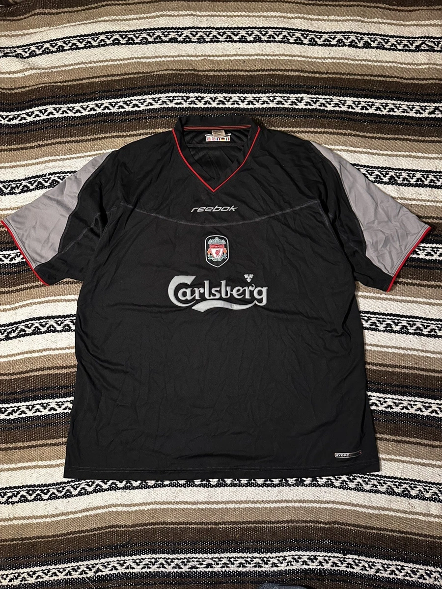 Preços baixos em Reebok Liverpool Preto Clube Internacional de