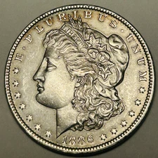 1886-P Morgan Silver Dollar - Bright  AU / BU Die Break on Reverse