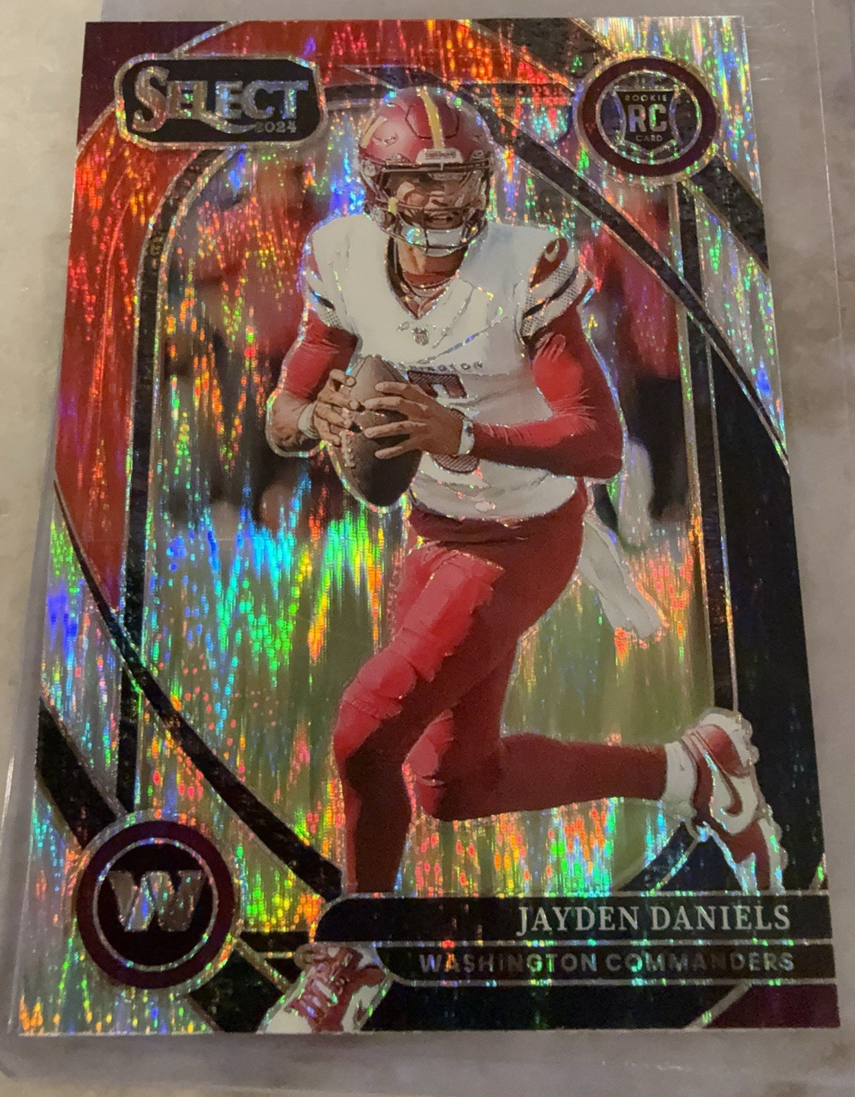 2024 Panini Select - Club Level Jayden Daniels #217 Black & Red Shock Prizm (RC)