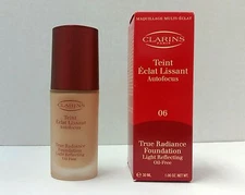 CLARINS TRUE RADIANCE FOUNDATION PRALINE 06 NEW IN BOX 1.06 OZ/ 30 ML