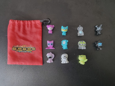 Explorer Gogo's Crazy Bones x11 - Serie 3 + Gogos Tasche Beutel 