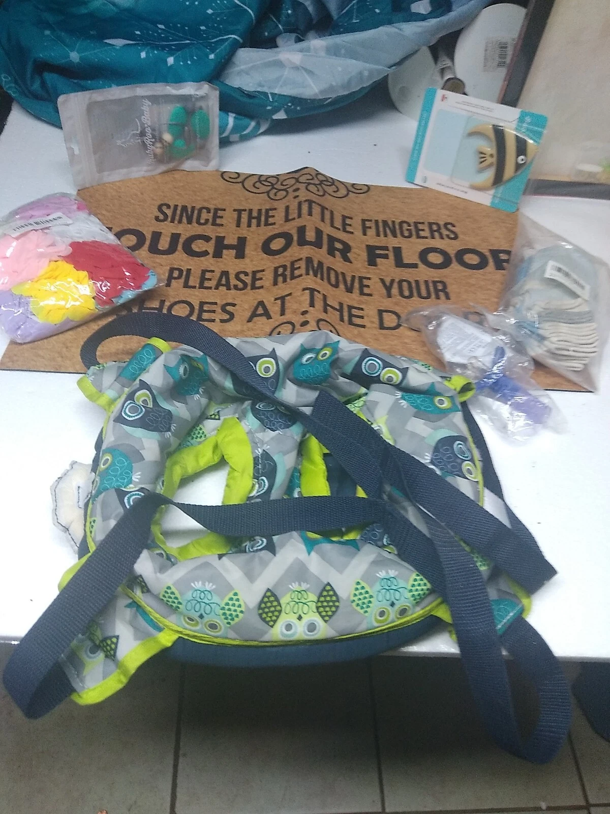 Infant/Toddler care bundle lot of 7. Jumper seat, 2 teethers, 6 pair sock, mat +