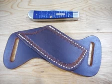 Cross Draw Buffalo leather knife sheath. Dark oil rustic tooled. fits a Trapper
