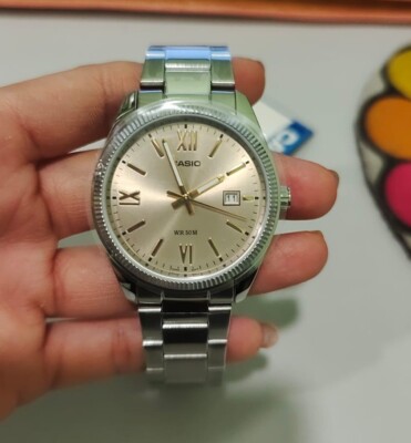 Casio MTP-1302DD-9A Beige Analog Roman Numeral Stainless Steel