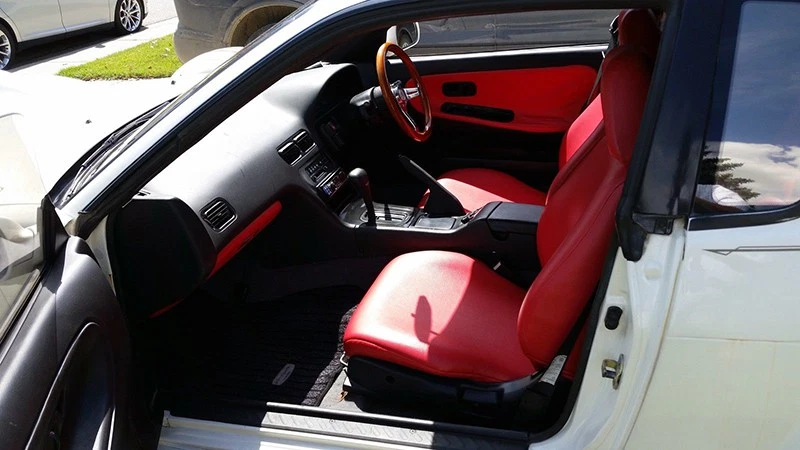 The Nissan roots are most visible inside the cockpit.