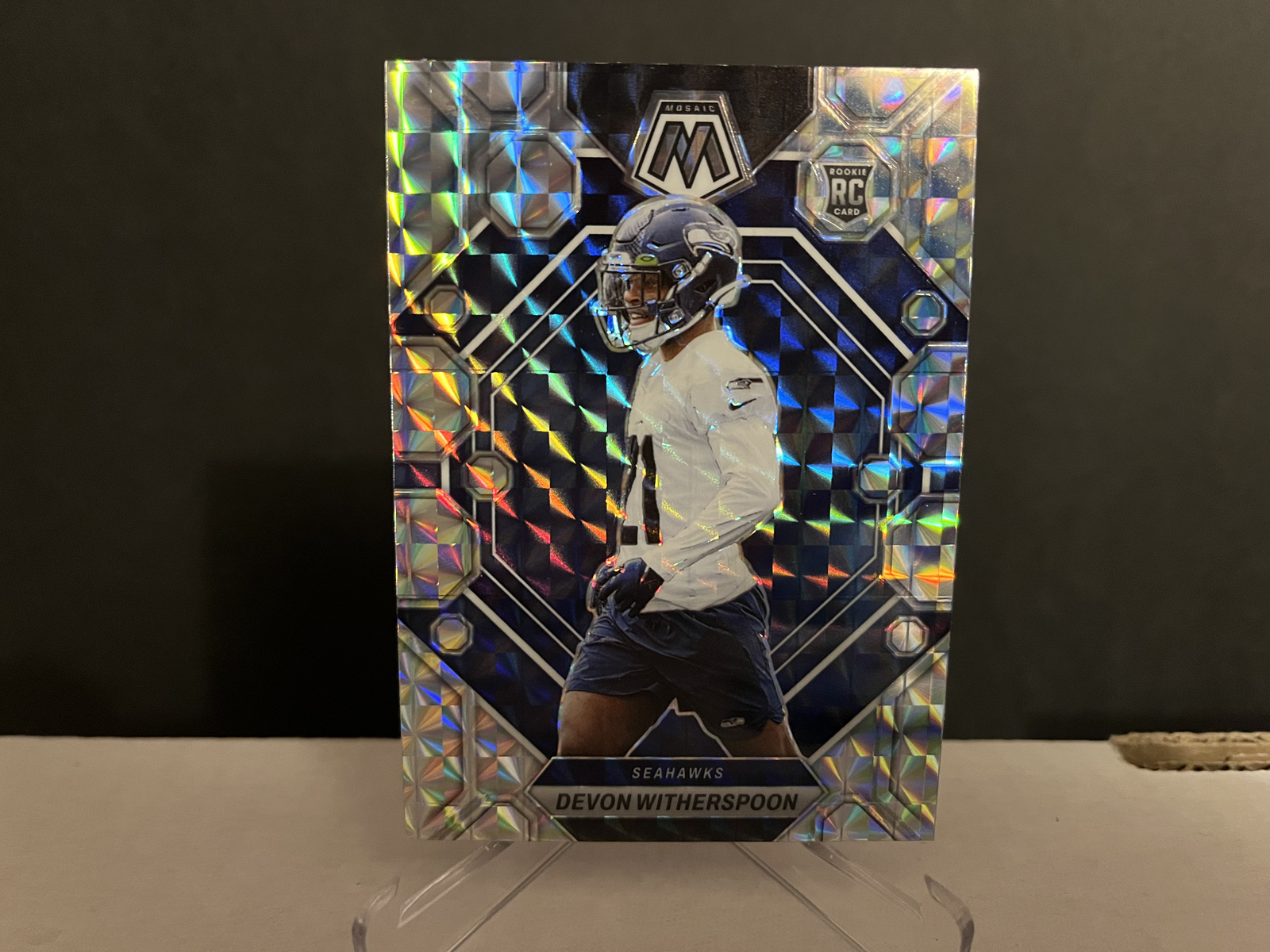 2023 NFL Panini Mosaic Football Devon Witherspoon #313 Mosaic Prizm Rookie Card