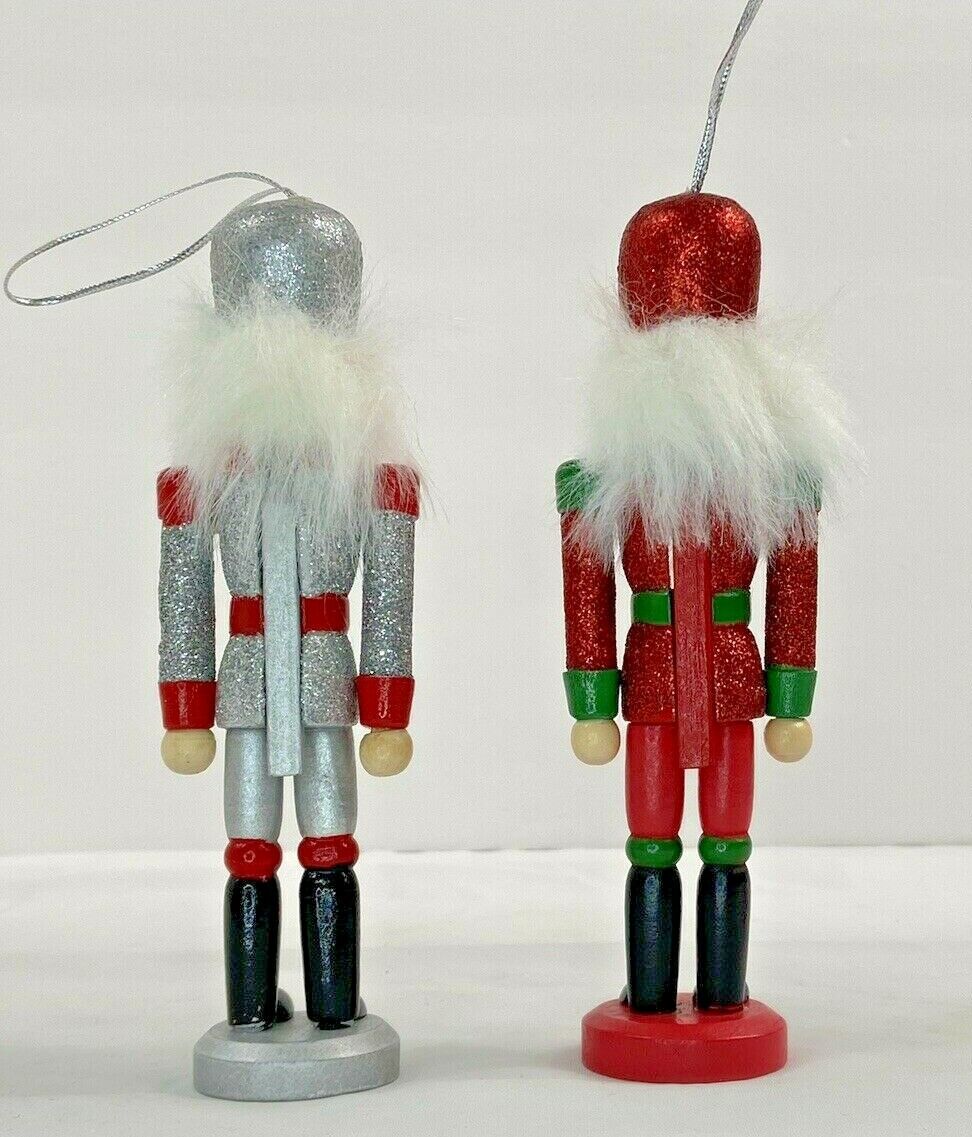 Pair Glittery Nutcracker Christmas Ornaments - Silver, Red, Green ...