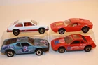 Four (4) Vintage 1970's-1980's Hot Wheels Cars FIERO / FERRARI / CITATION / BMW