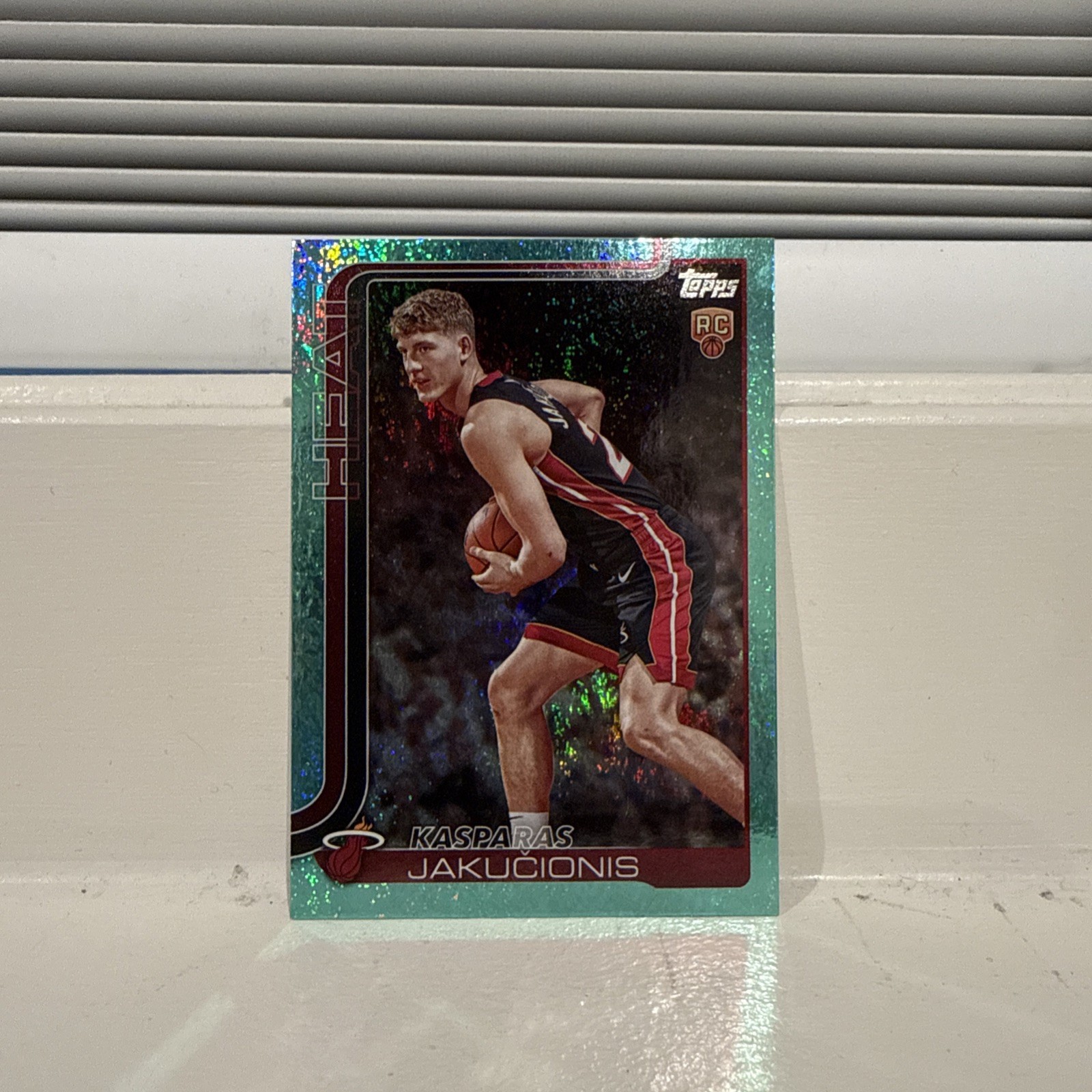 2025-26 Topps Basketball Kasparas Jakucionis RC Aqua Teal Foil SSP #220 (1:500)