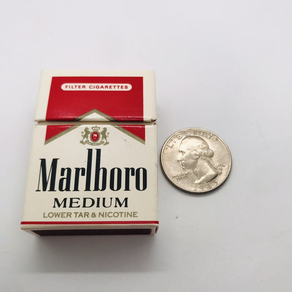 does 7 11 have cigarettes Shelves of cigarette packs for sale inside 7-Eleven convenience... News  Photo