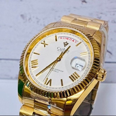 Japanese made CADISEN automatic watch with transparent back C 8185G gold date