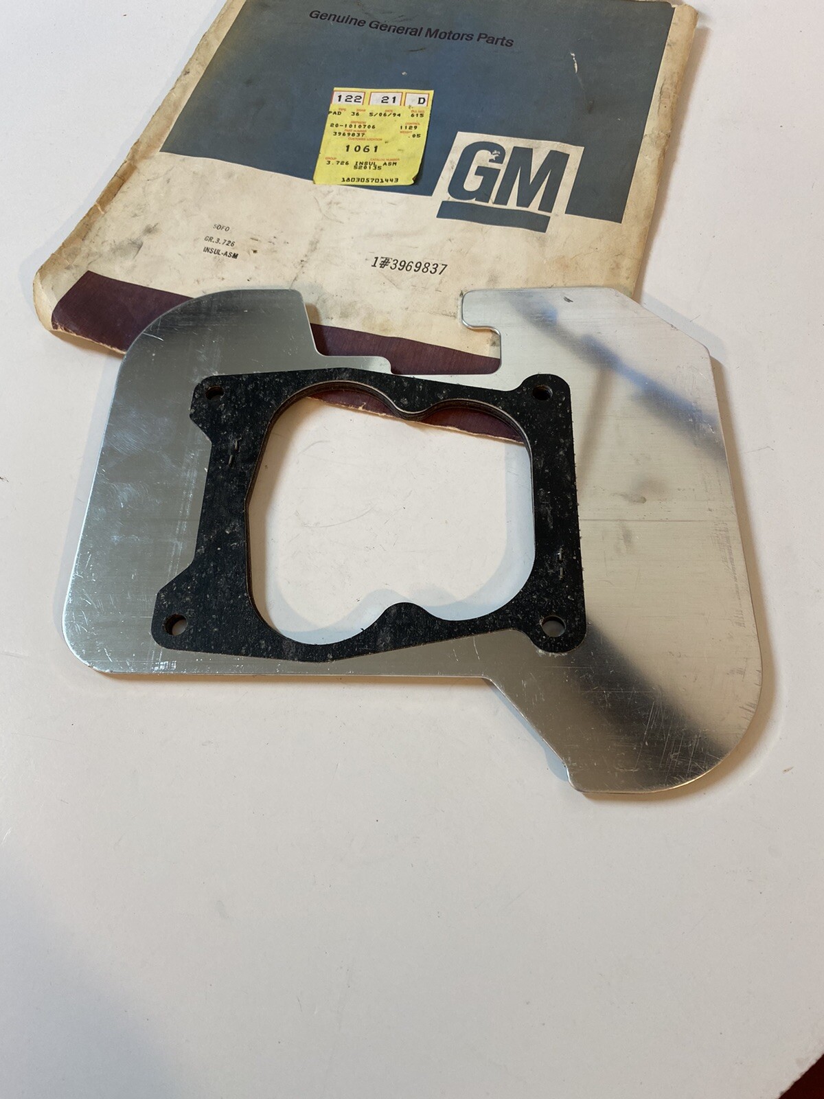 Original GM NOS Quadrajet 4 BBL Carburetor Heat Shield Insulator