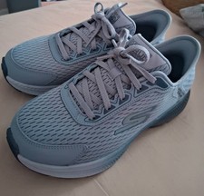 Ladies Blue/Grey Slip In Skechers trainers.