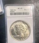 1921 HIGH RELIEF PEACE DOLLAR NGC MS-63 in ANACS SOAPBOX. A Great Value!