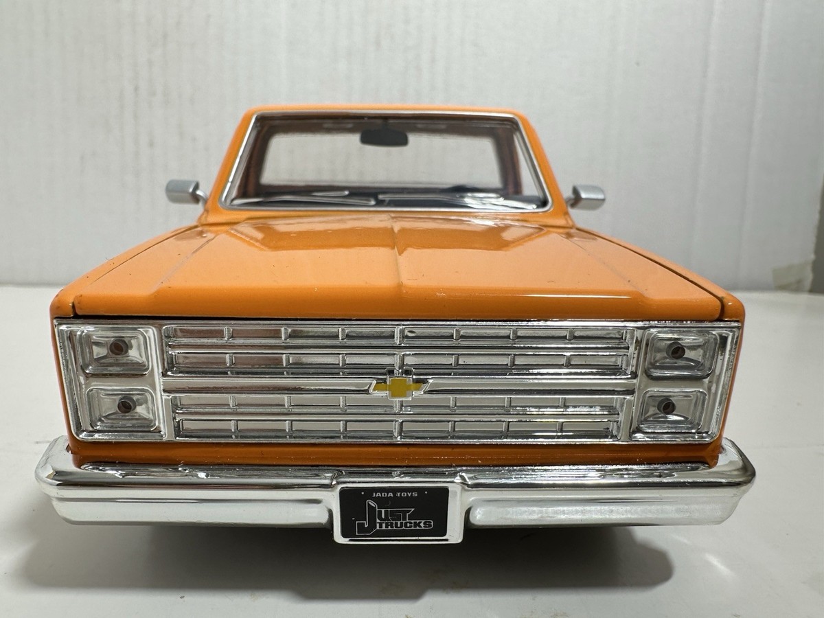 JADA JUST TRUCKS 1985 CHEVY C10 PICKUP TRUCK ORANGE / WHITE 1:24