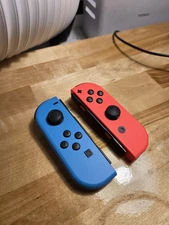(New) Nintendo Switch Joy-Con Pair Neon Red and Neon Blue